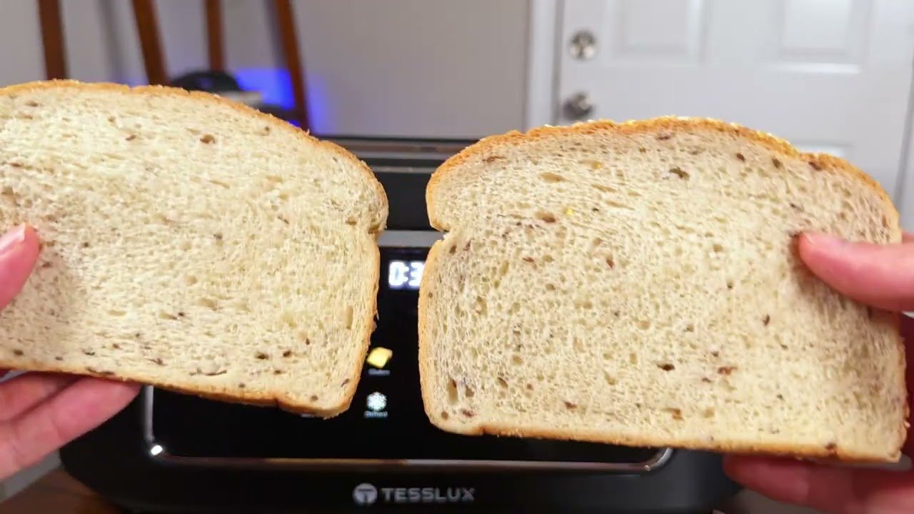 review-1-29 Tesslux 4 Slice Touch Screen Toaster on the kitchen counter with the touchscreen lit up