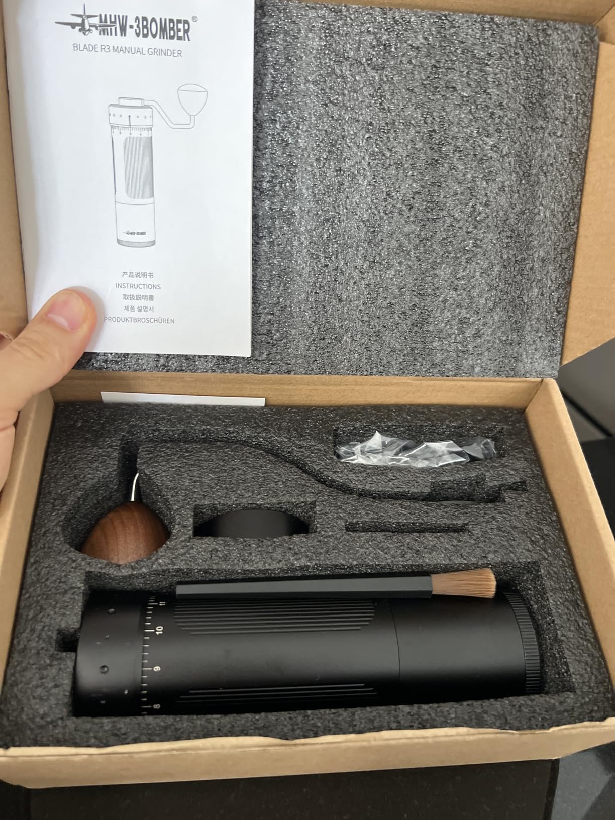 review-1-9 MHW-3BOMBER R3 magnetic catch cup and sieves laid out on a counter